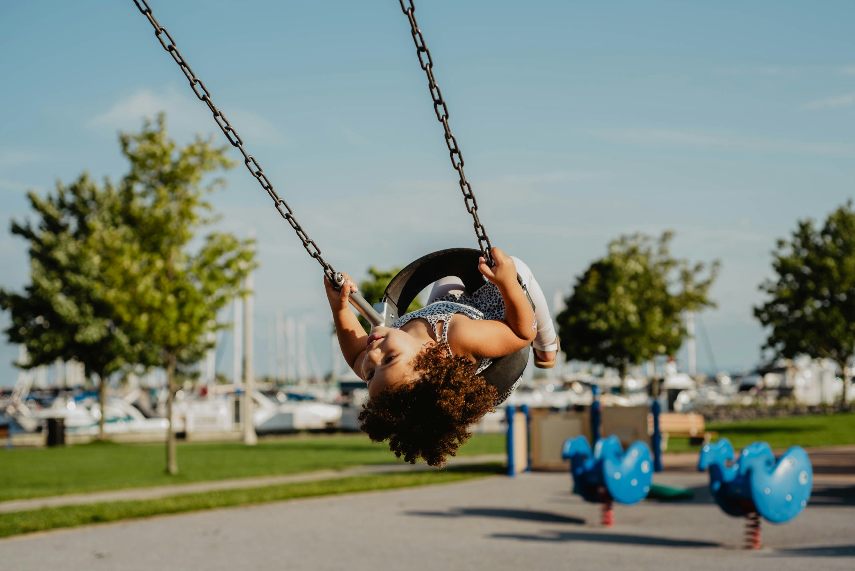 A child climbing up a slide